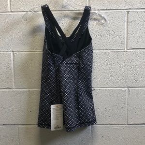 lululemon athletica Tops - Lululemon black and white tank, sz 8, 62902, NWT lululemon athletica Tops - Lululemon black and white tank, sz 8, 62902, NWT